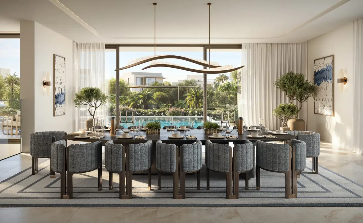 Formal dining room overlooking the lagoon at Address Villas Tierra