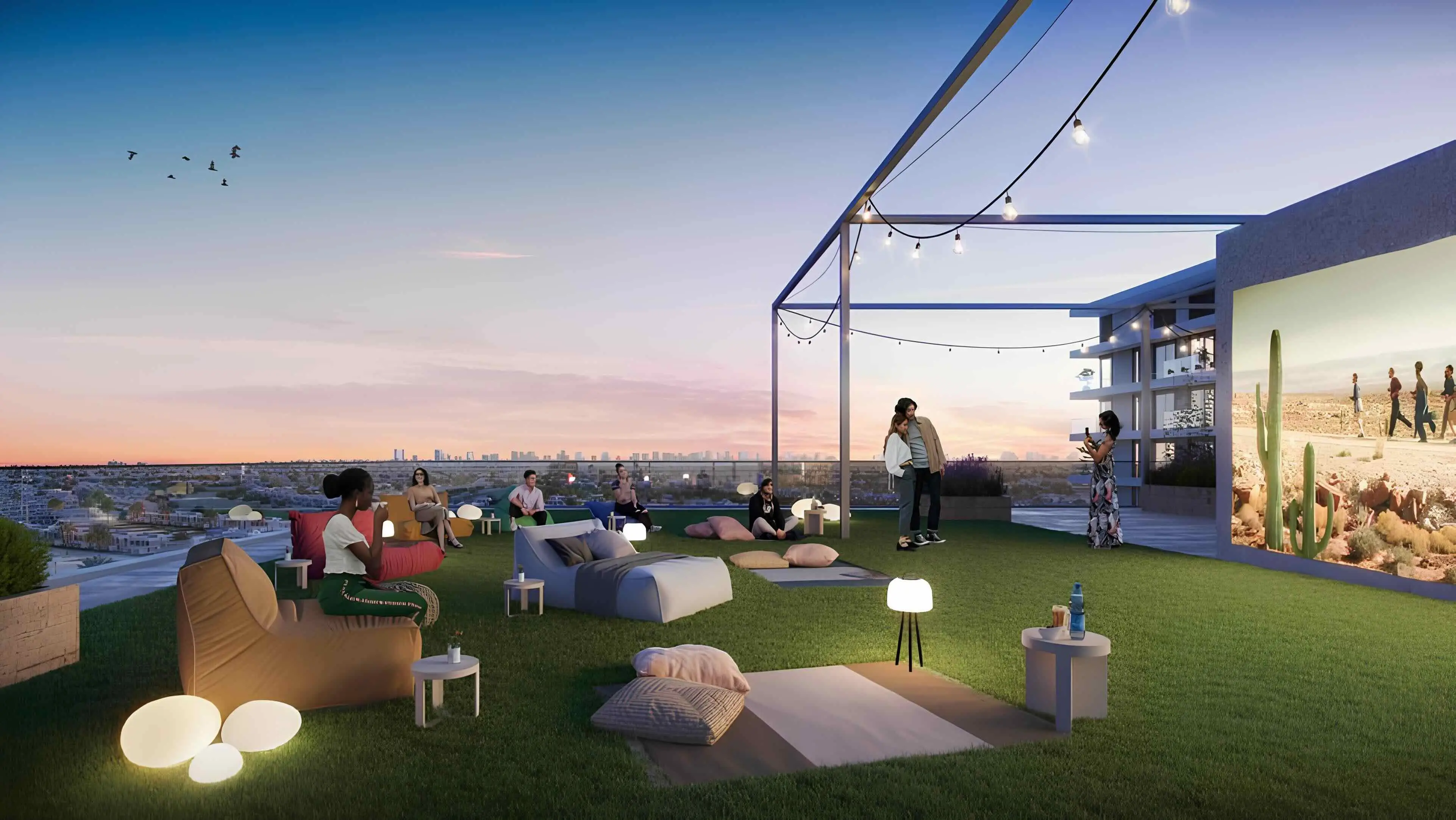 Club Drive rooftop outdoor cinema and social lawn at sunset