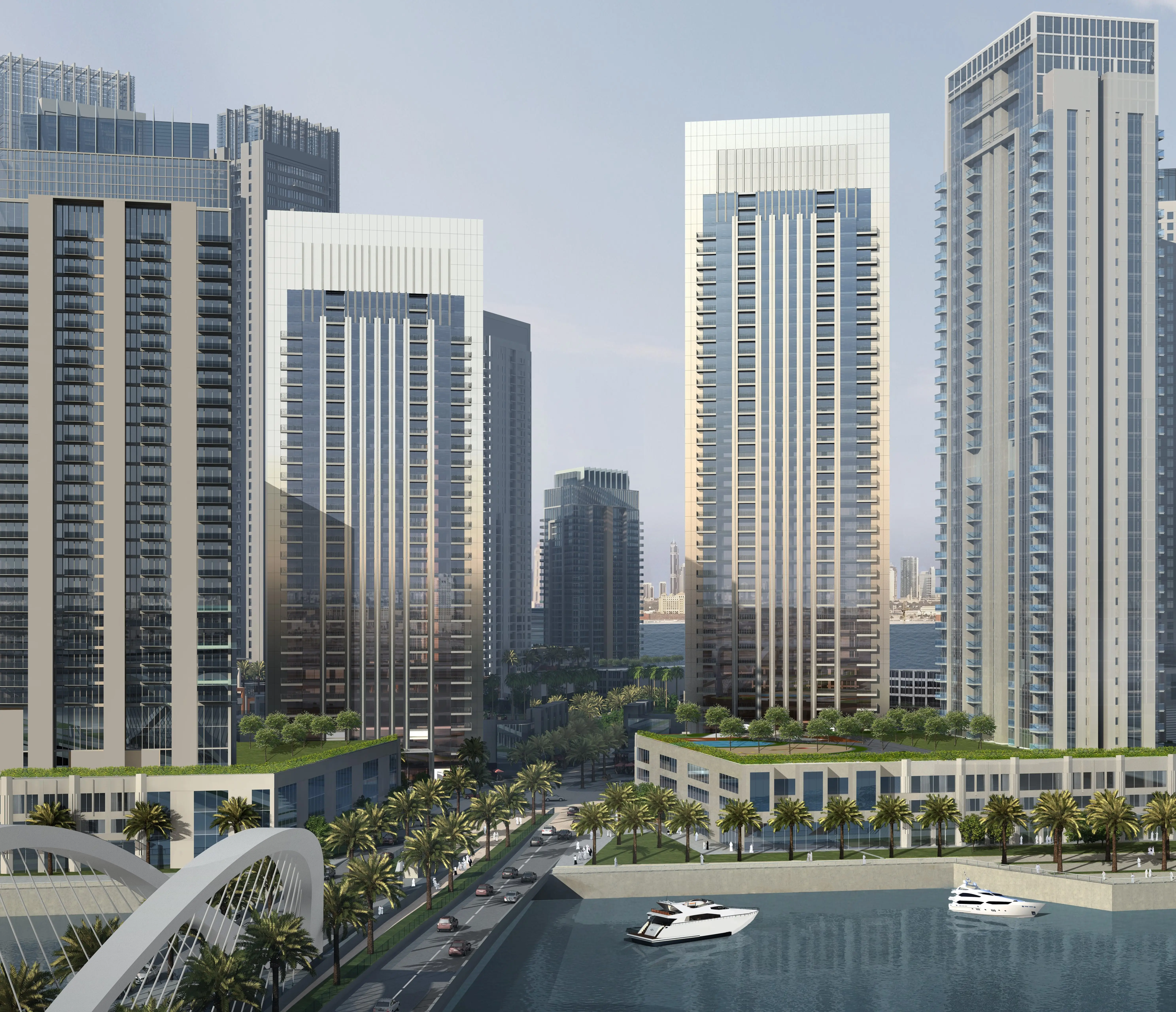 Creek Gate towers beside the waterway and pedestrian bridge
