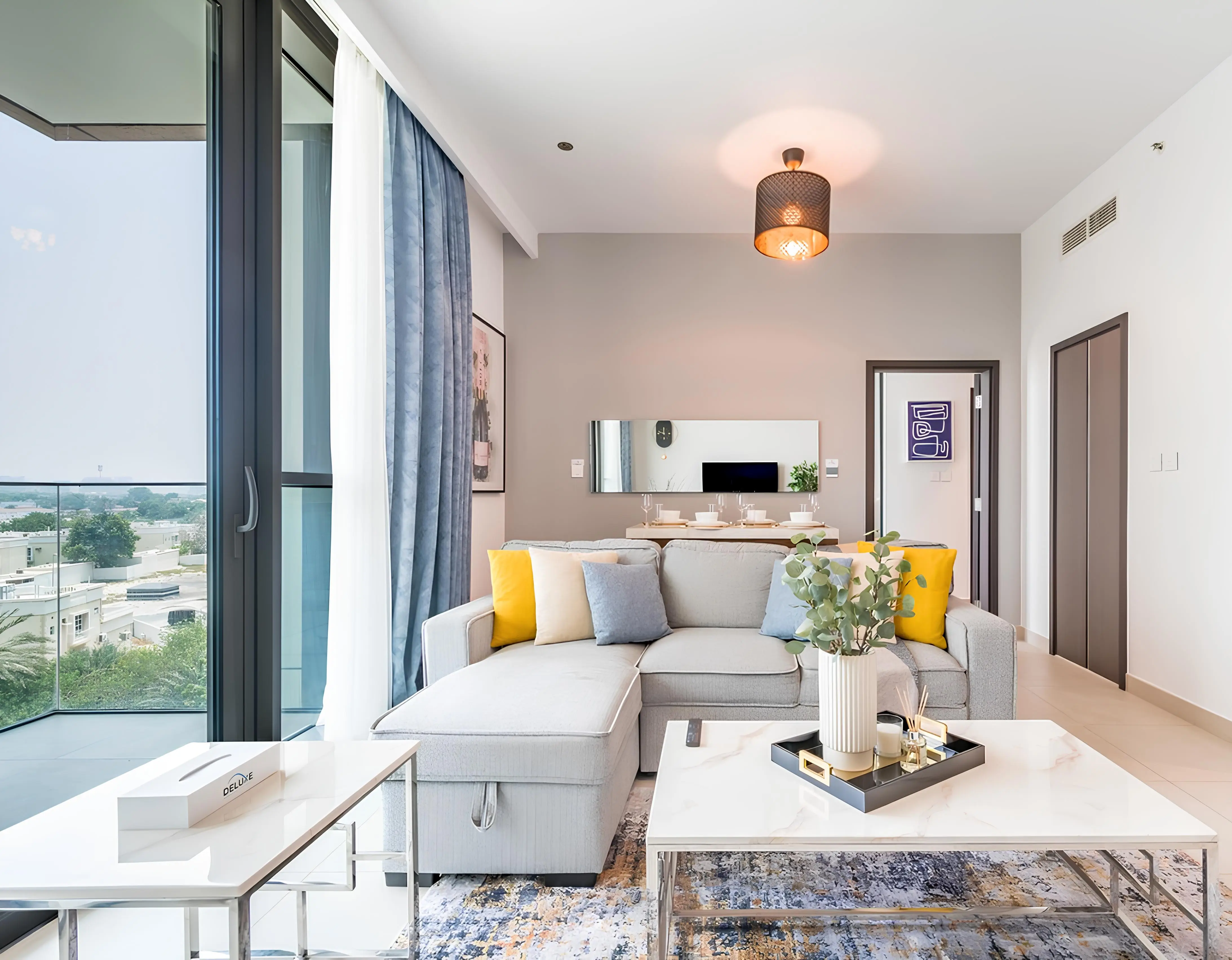 Downtown Views apartment living room with panoramic glazing