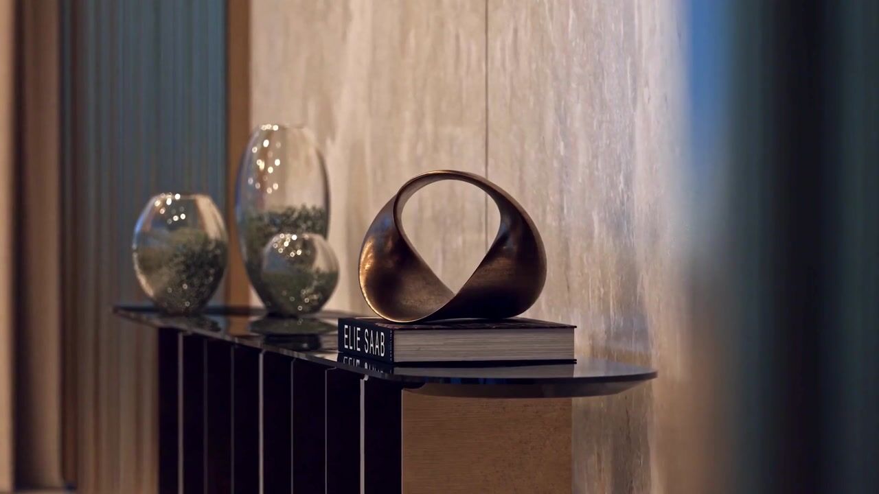 Interior console and sculptural objects in an Elie Saab Waterfront residence by Ohana