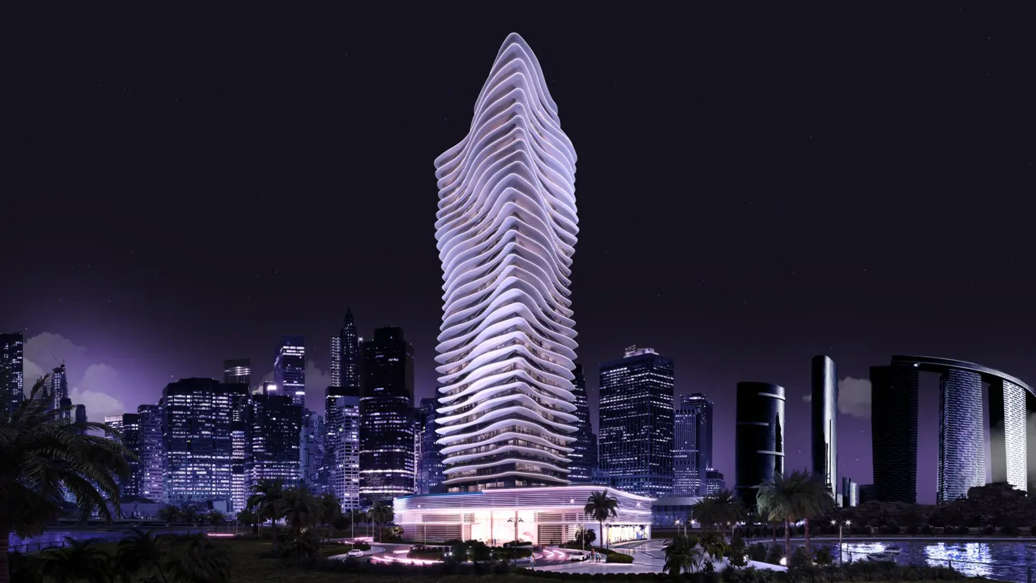 Elie Saab Waterfront by Ohana tower at night on Al Reem Island with the Abu Dhabi skyline lit behind
