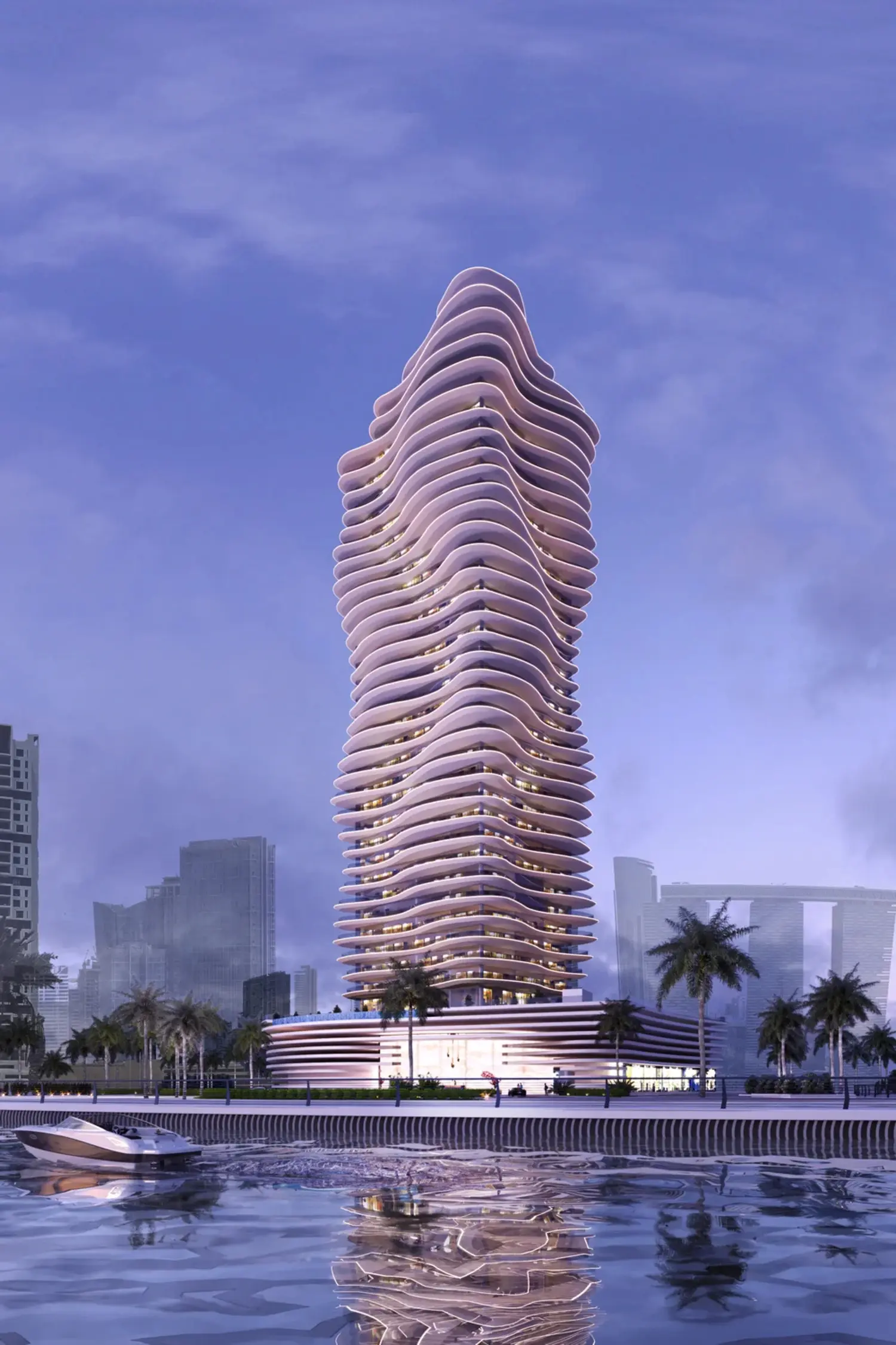 Elie Saab Waterfront by Ohana wavy facade at dusk on Al Reem Island with lights reflecting on the water