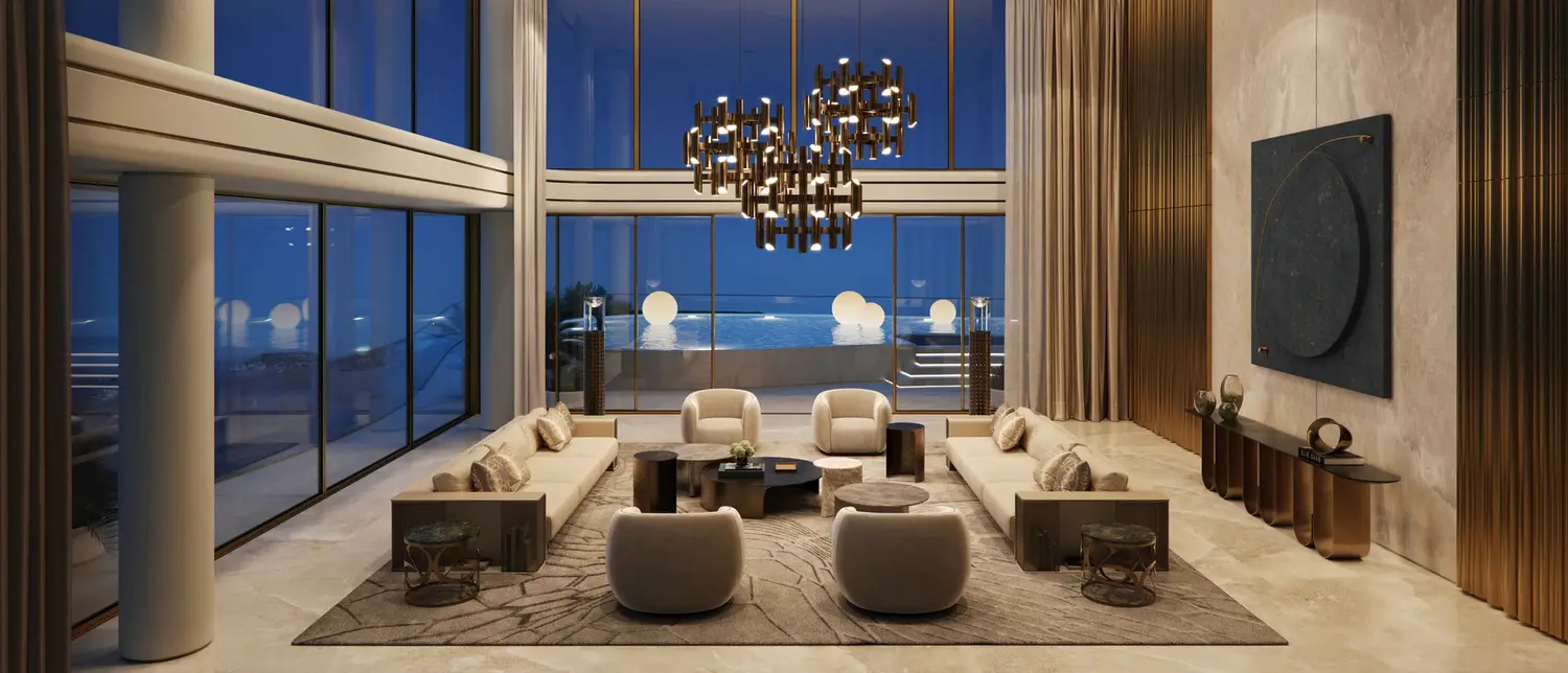 Penthouse living room at Elie Saab Waterfront by Ohana with infinity pool lighting and sea views at dusk, Al Reem Island