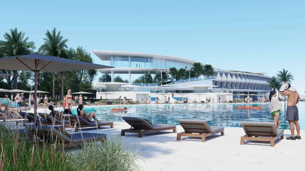 Row of luxury townhouses along a tree-lined street at Manchester City Yas Residences by Ohana
