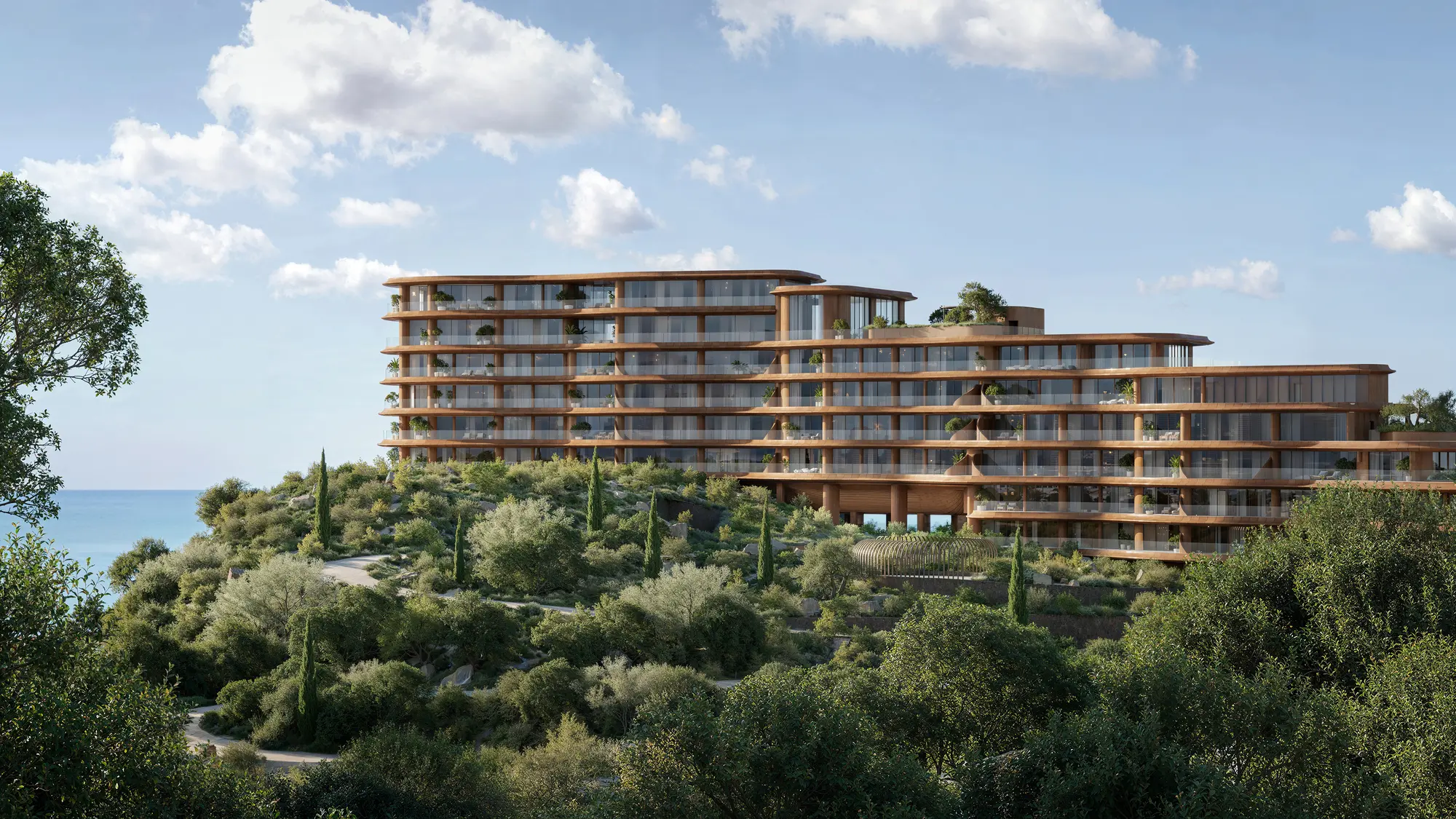 Aerial hillside view across Jumeirah Asora Bay toward the Arabian Gulf