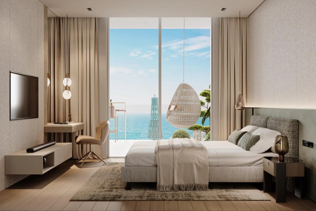 Furnished bedroom with sea view at Vienna House Residences by Wyndham