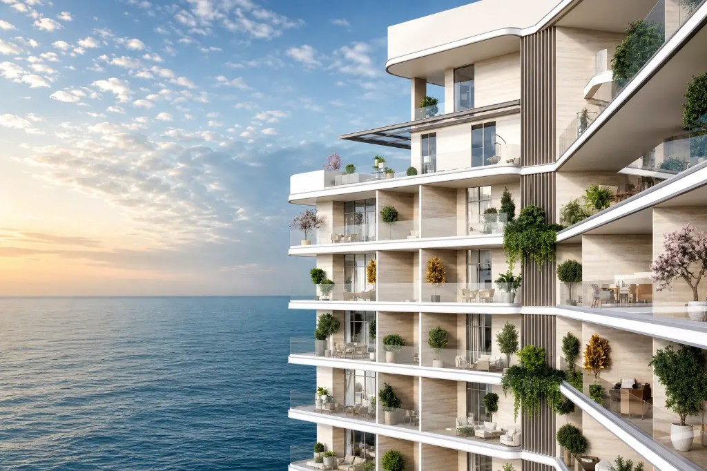 Vienna House Residences by Wyndham, cream facade with landscaped balconies and Arabian Gulf views on Al Marjan Island