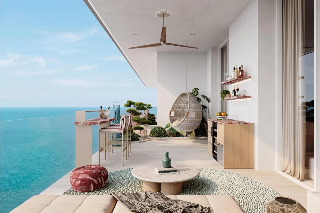 Outdoor lounge terrace at Vienna House Residences by Wyndham