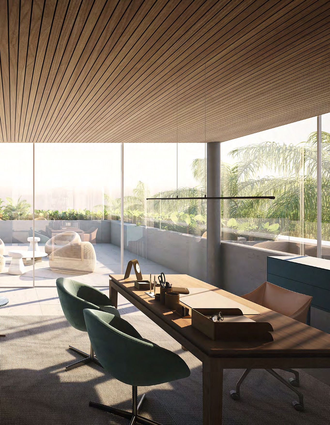 Home office overlooking a tropical terrace in a Sea Mirror villa on Jumeirah Bay Island