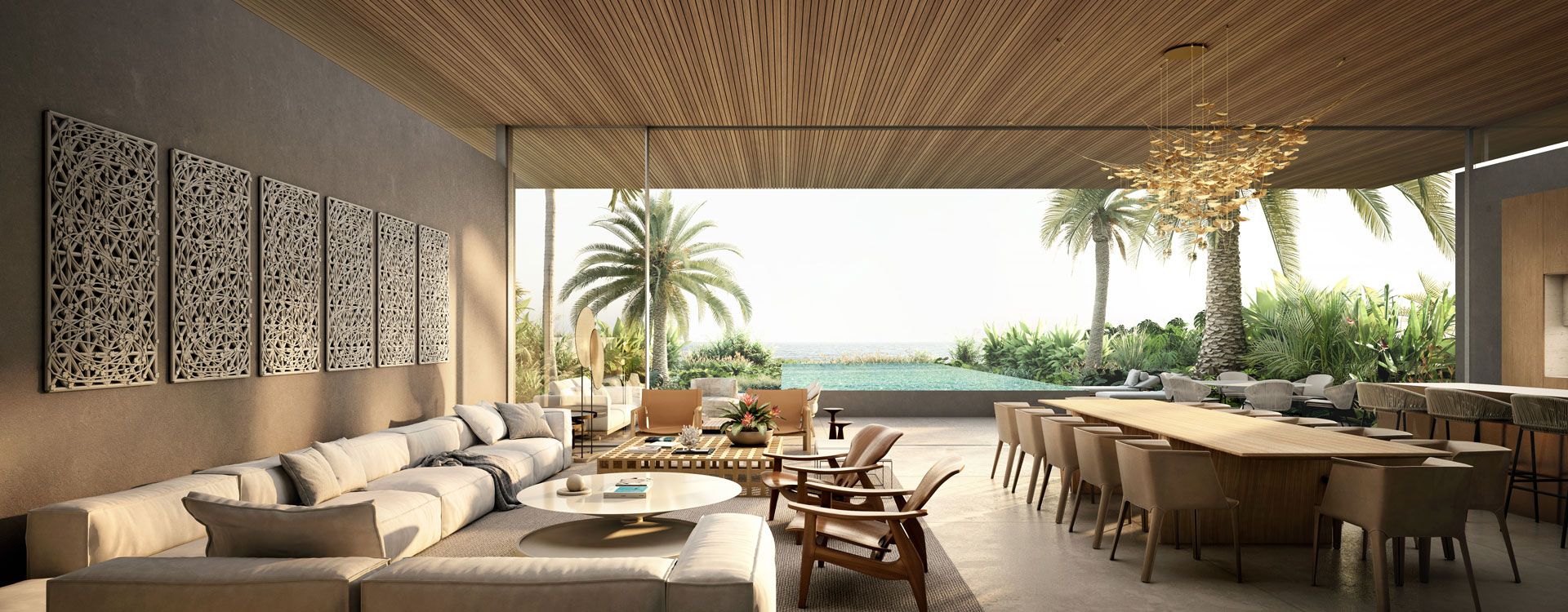 Living and dining room opening to pool and ocean at a Sea Mirror villa on Jumeirah Bay Island