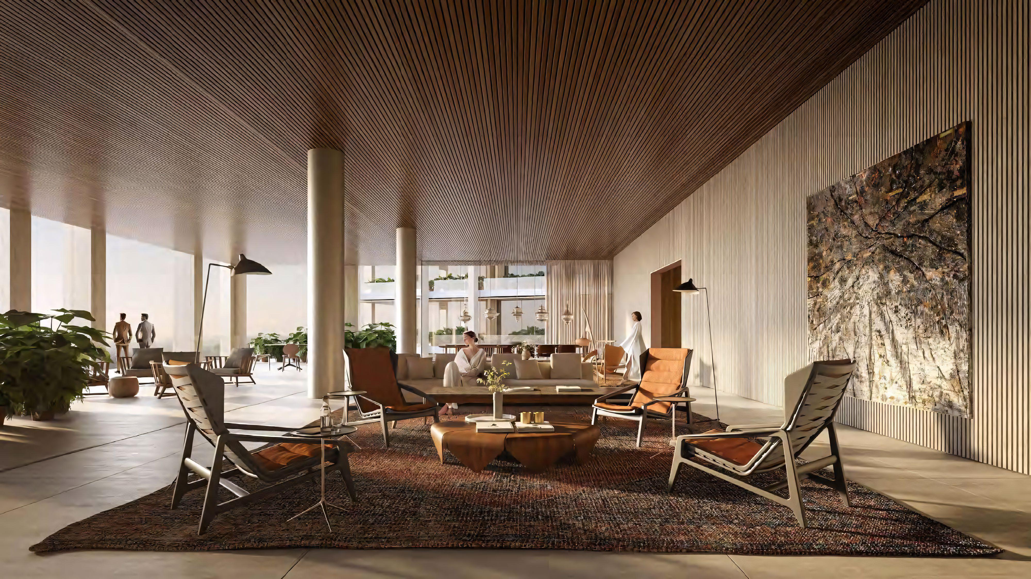 High-ceiling living room opening to a terrace at a Sea Mirror villa on Jumeirah Bay Island
