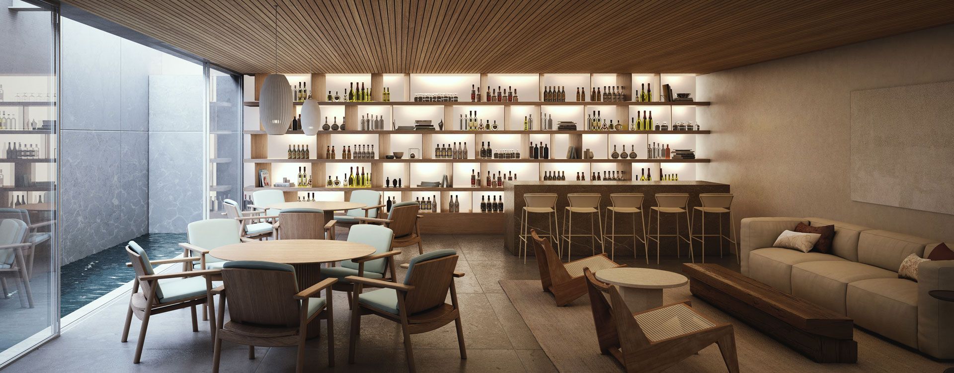 Interior lounge and backlit bar in a Sea Mirror villa on Jumeirah Bay Island