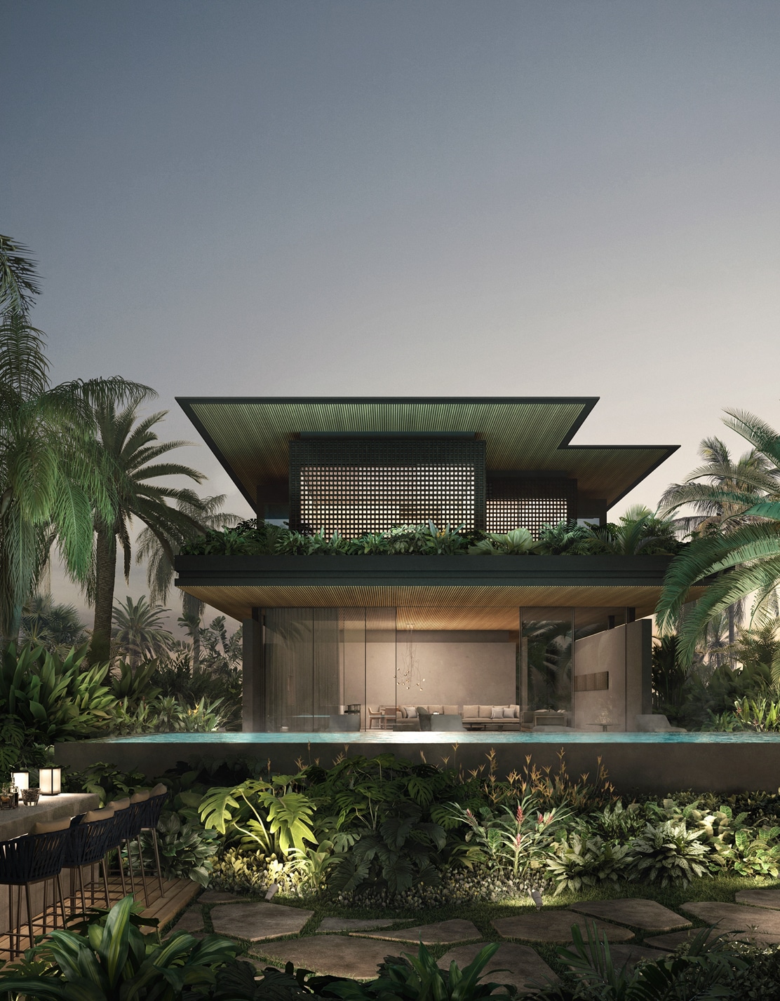 Sea Mirror villa exterior at dusk with glowing infinity pool and tropical garden on Jumeirah Bay Island