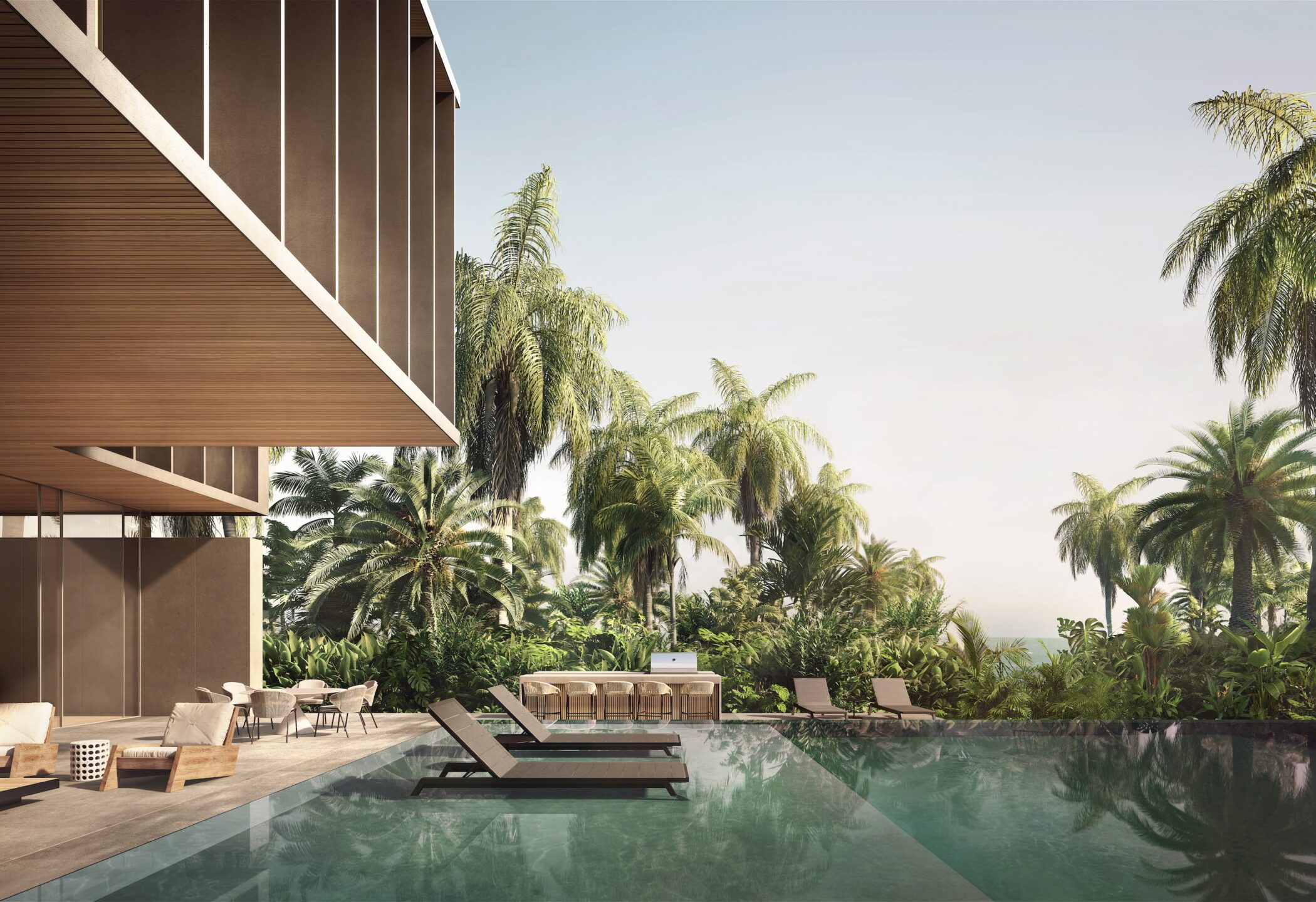 Infinity pool and tropical garden terrace at a Sea Mirror villa on Jumeirah Bay Island
