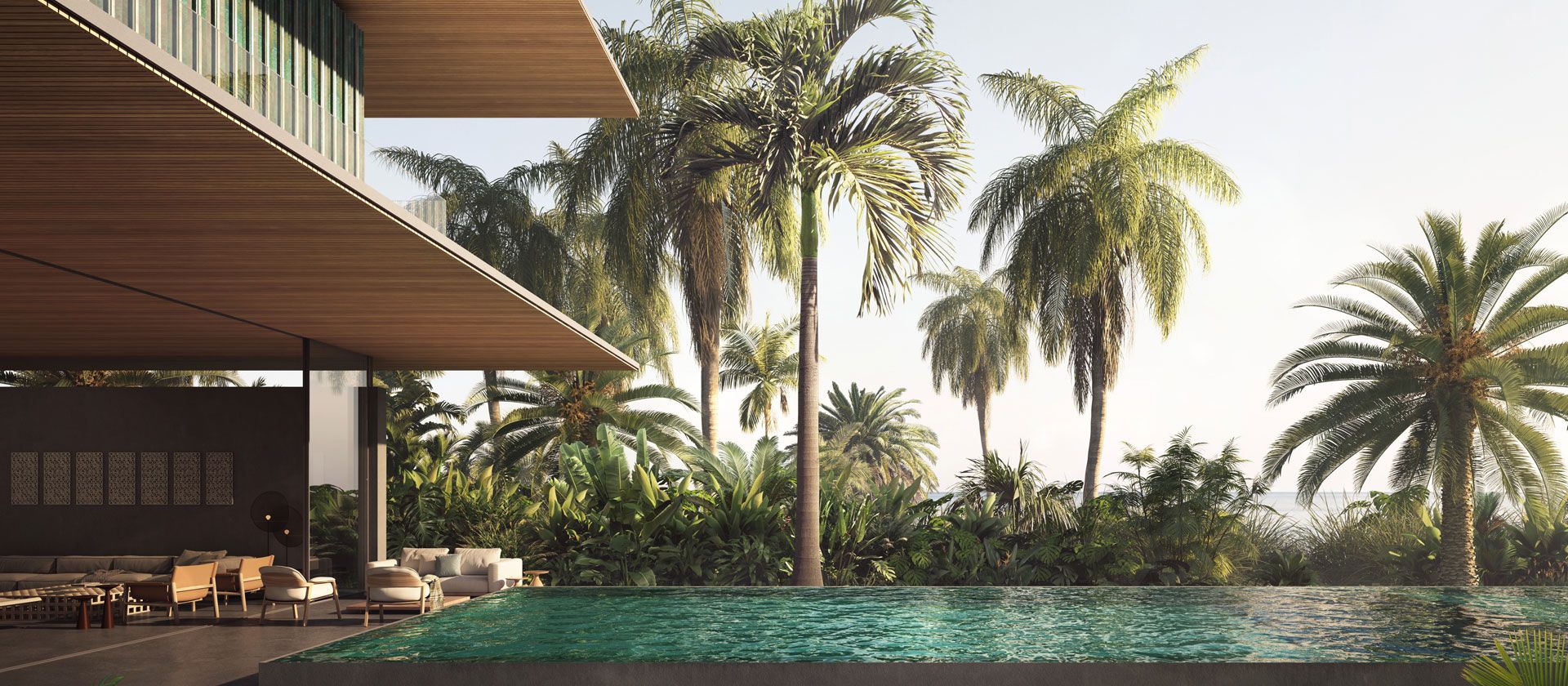 Poolside lounge under a wood overhang at a Sea Mirror villa on Jumeirah Bay Island